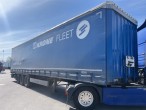 Напівпричіп штора Krone 1034102